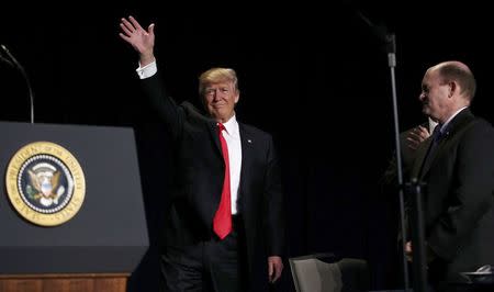 U.S. President Donald Trump arrives to deliver remarks at the National Prayer Breakfast in Washington, U.S., February 2, 2017. REUTERS/Carlos Barria