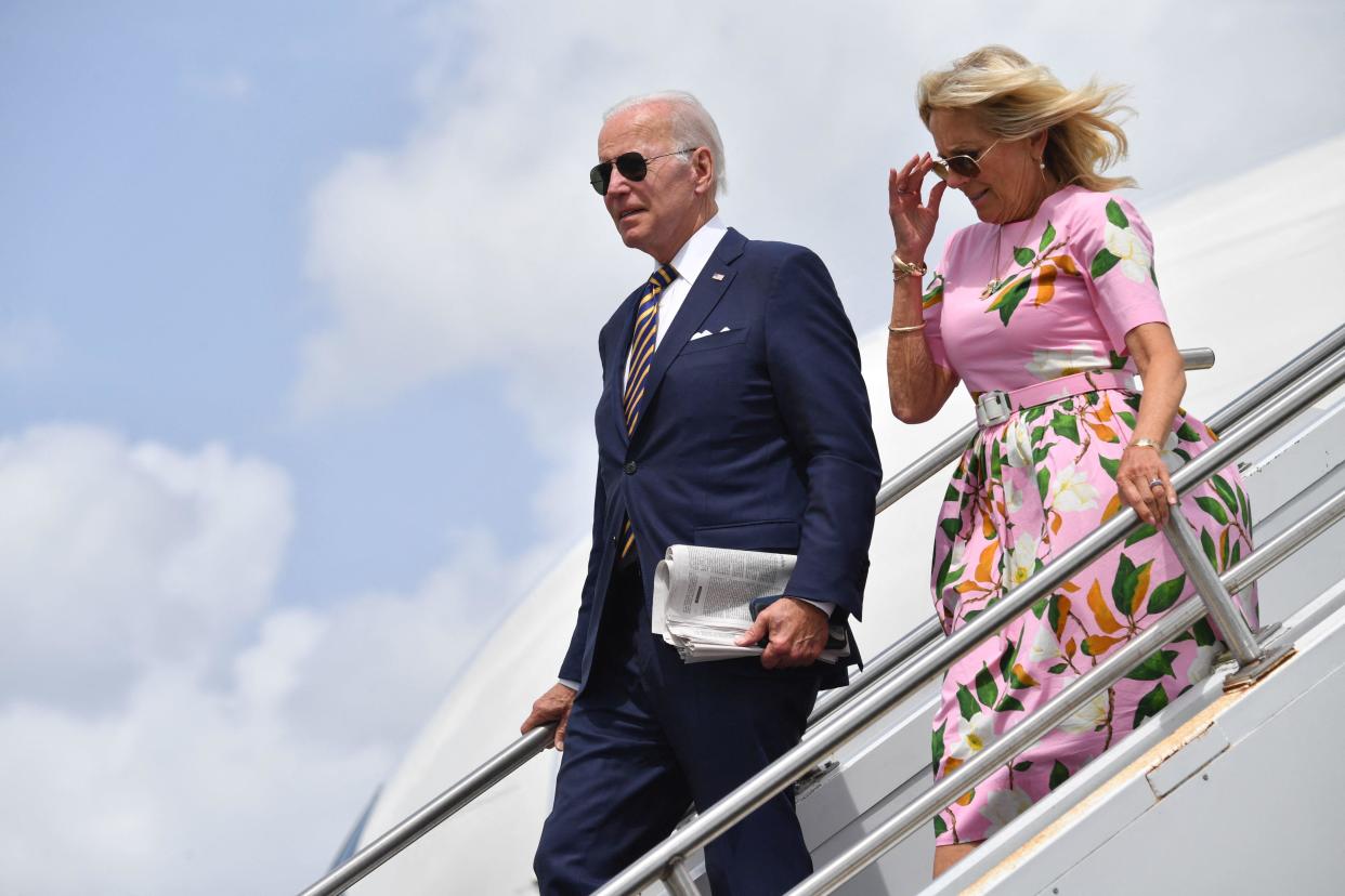 US President Joe Biden and US First Lady Jill Biden disembark Air Force One at Charleston Air Force Base in North Charleston, South Carolina, on August 10, 2022.  / Credit: NICHOLAS KAMM/AFP via Getty Images