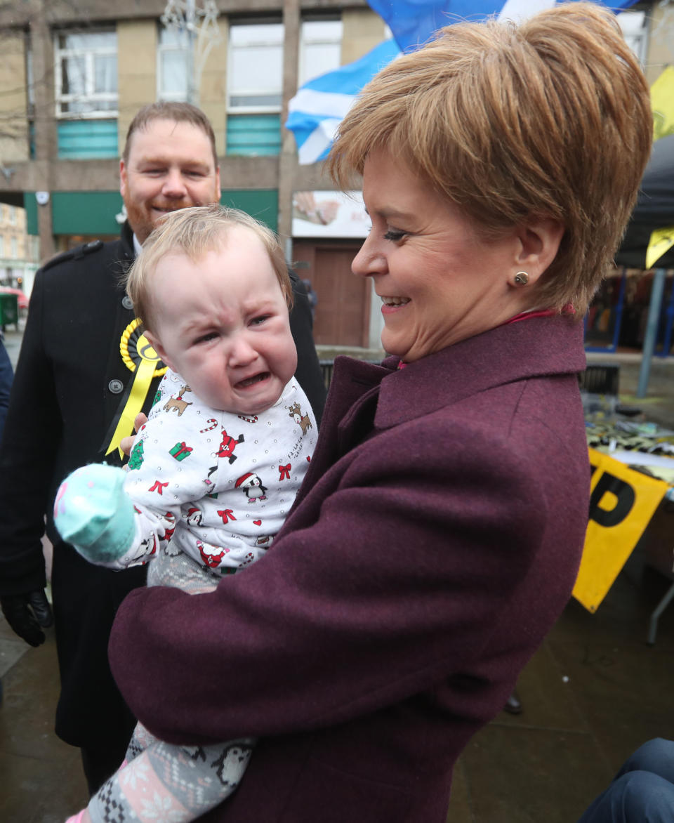 SNP leader Nicola Sturgeon holds a baby in Dalkeith, while on the General Election campaign trail in Scotland. PA Photo. Picture date: Wednesday December 4, 2019. See PA story POLITICS Election . Photo credit should read: Andrew Milligan/PA Wire