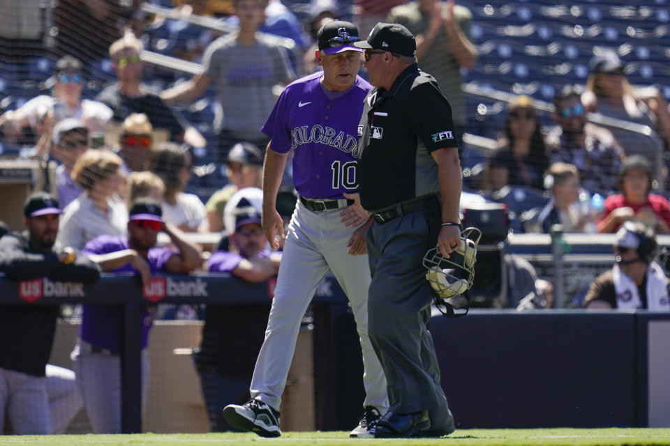 Colorado Rockies manager Bud Black has words with home plate umpire Marvin Hudson after being ejected during the fifth inning of the first baseball game of a doubleheader against the San Diego Padres, Tuesday, Aug. 2, 2022, in San Diego. (AP Photo/Gregory Bull)