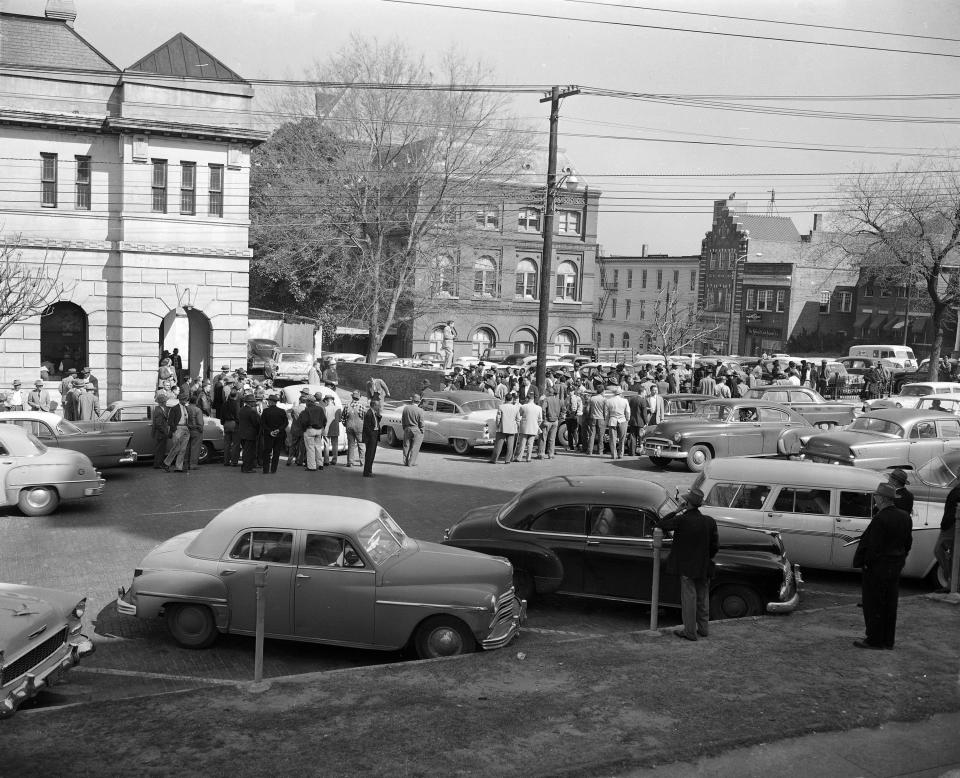 An orderly crowd of African Americans gathers outside the Montgomery County jail, Feb. 22, 1956 in Alabama.