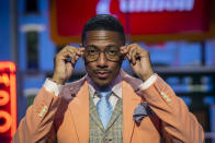 Talk show host Nick Cannon poses for a portrait on the set of "Nick Cannon" at Metropolitan Studios in New York on Sept. 16, 2021. His nationally syndicated daytime talk show premieres Sept. 27 on Fox Television Stations. (Photo by Andy Kropa/Invision/AP)