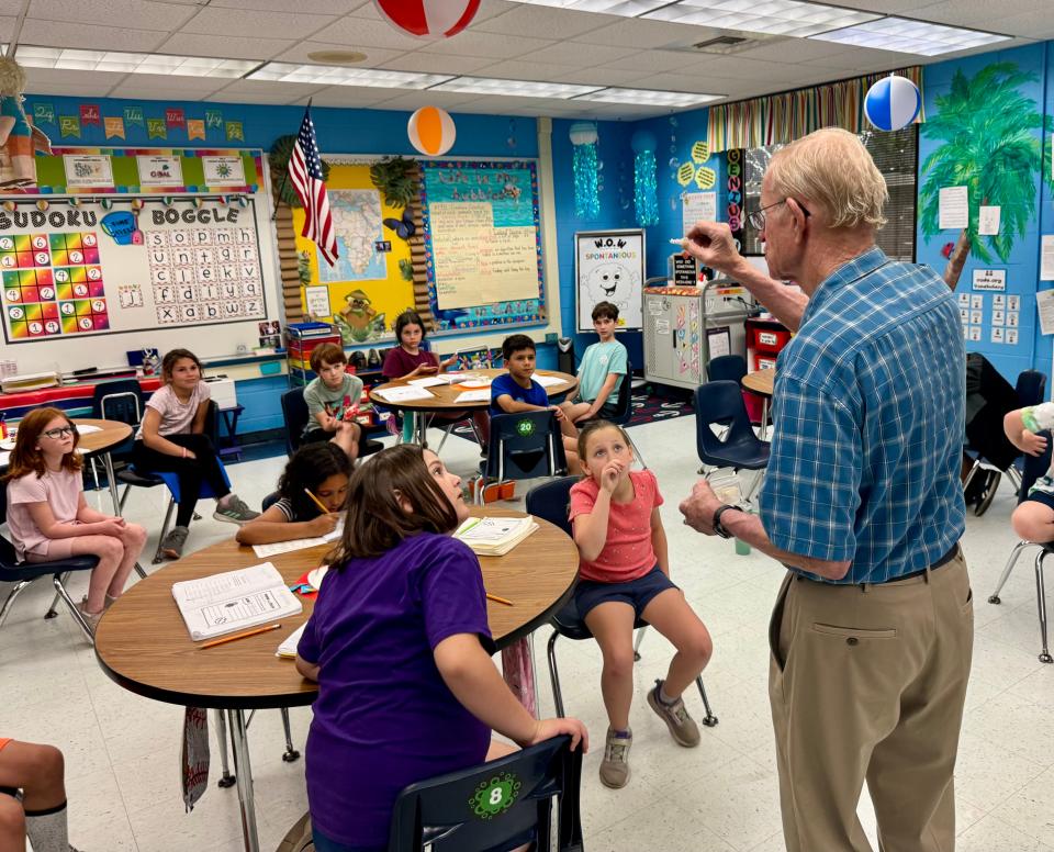 Bill Longenecker, a retired paramedic, talks to third-graders at Neptune Beach Elementary about the sand on our beaches (and other examples of Florida's geology).  Longenecker has been volunteering at local schools and presenting science programs for years.