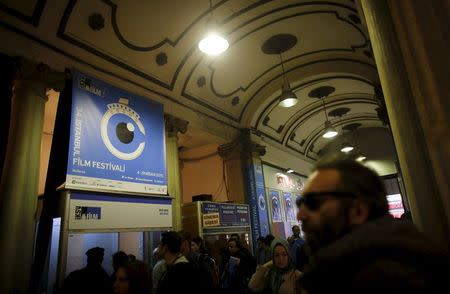 People queue to buy tickets for Istanbul Film Festival at Atlas movie theatre in Istanbul April 14, 2015. REUTERS/Murad Sezer