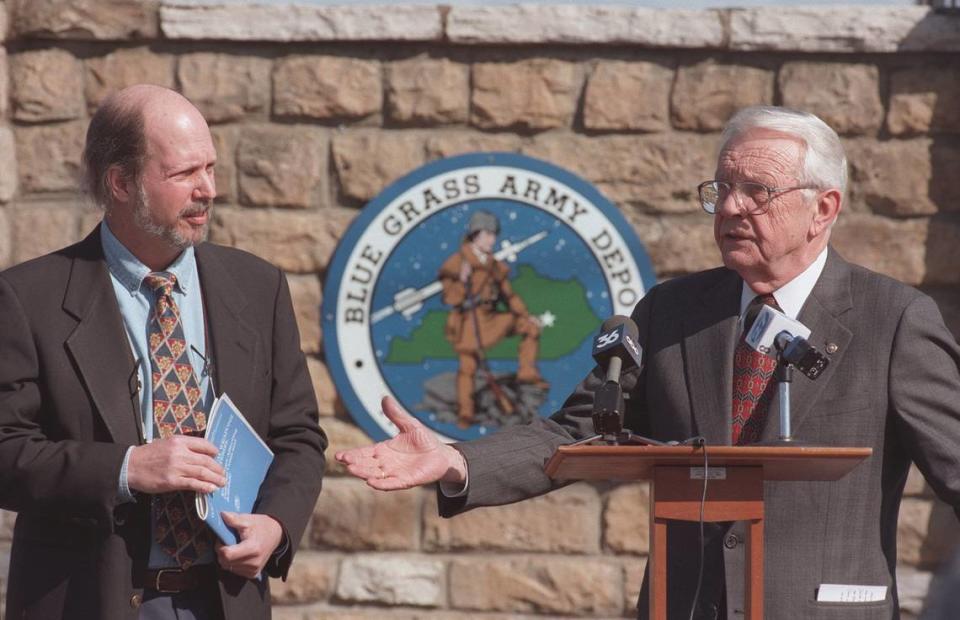 In 1997, Craig Williams, left, watched as Sen. Wendell Ford announced that the search for chemical weapons disposal alternatives would continue under the Chemical Weapons Convention treaty.
