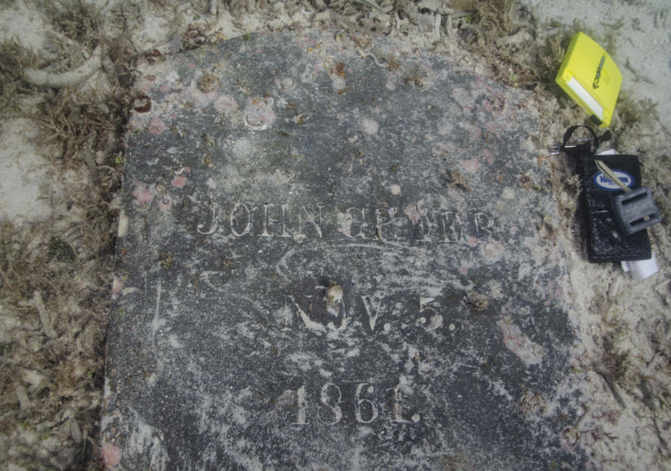 This image courtesy of the National Park Service shows the headstone of John Greer, which was found underwater by archeologists during a survey at Dry Tortugas National Park in August 2022, in Florida. The inscription reads "John Greer. Nov. 5. 1861." Archeologists have found the remains of a 19th century quarantine hospital and cemetery on a submerged island in Florida's Dry Tortugas National Park, according to park officials Monday, May 1, 2023. (C. Sproul/National Park Service via AP)