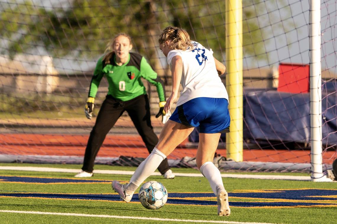 Joshua’s Maddy Bourzikas lines up for a short-side goal against Caitlyn Brown of Justin Northwest in a Class 5A area-round girls soccer match on Friday, March 29, 2024 at Boswell High School in Fort Worth ,Texas. Bourzikas finished with two goals in Joshua’s 4-1 win. Oscar Perez/O&D Sports Photography