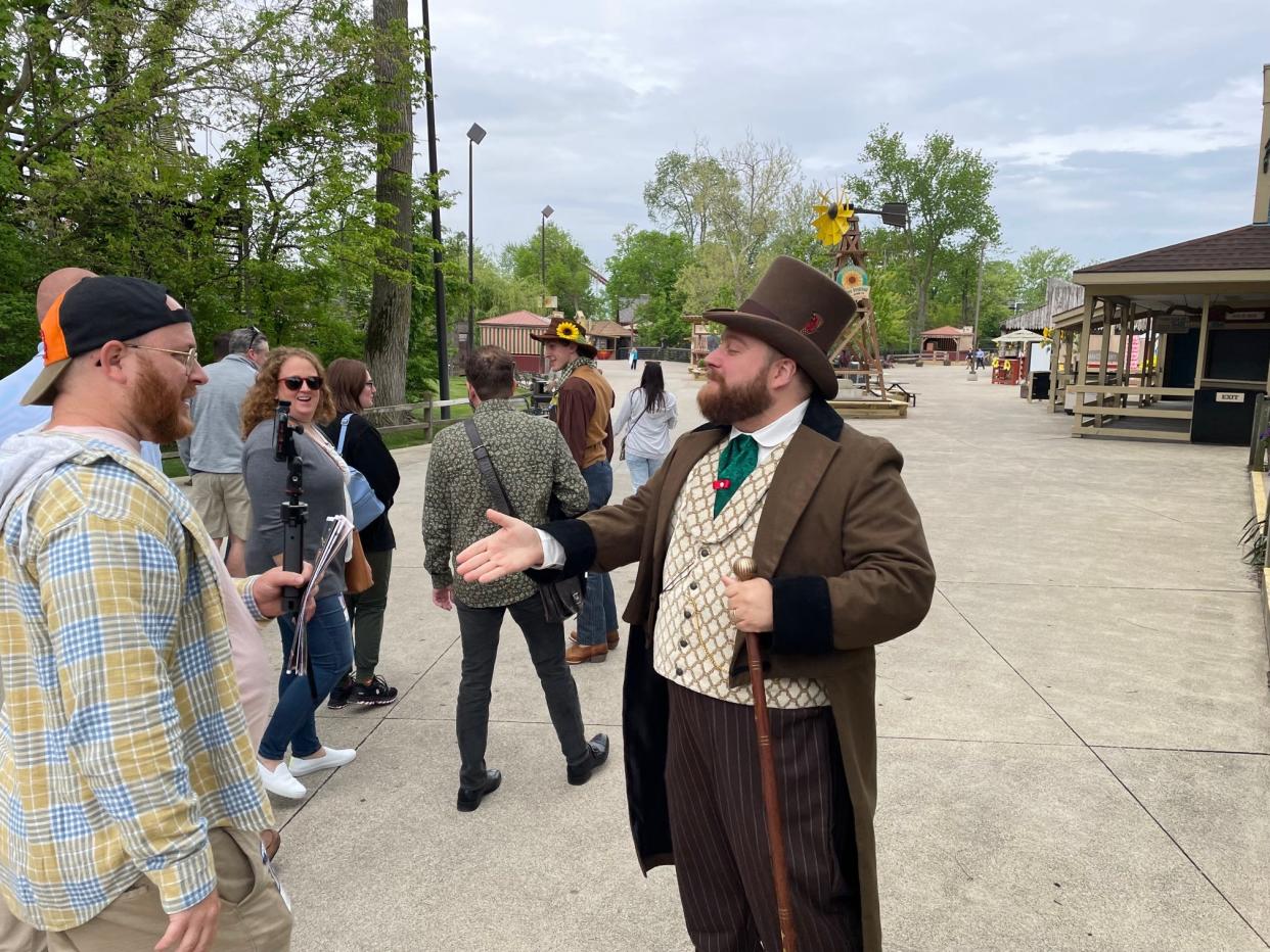 The mayor of Cedar Point's Frontier Town greets guests at the park's Frontier Festival.
