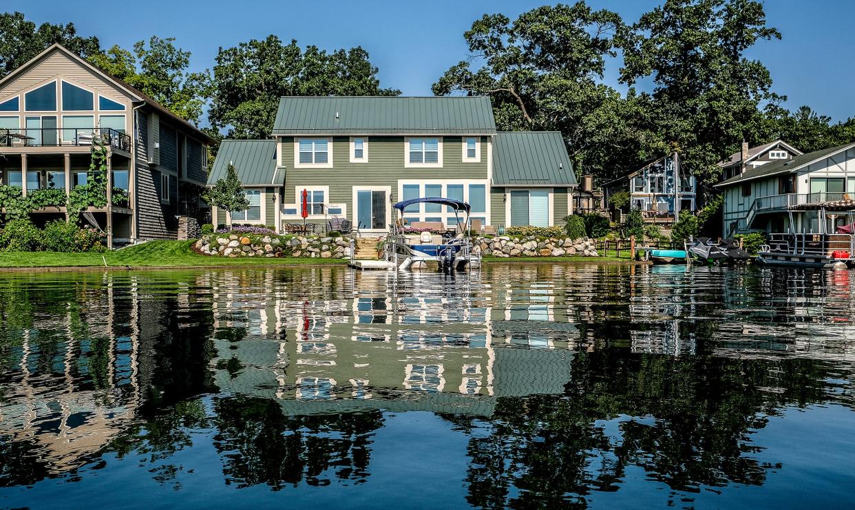 Lakefront homes on Lake Lansing near the dam that officials say will fail it's next inspection.