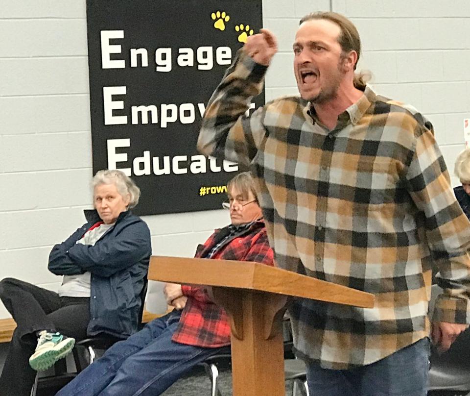 Seth Huizenga becomes angry as he speaks to the ROWVA School Board Tuesday night. Two Knox County sheriff's deputies arrived 15 minutes or so after Huizenga and Christy Gerard questioned why the board didn't hire Tara Huizenga to an open art teaching position.