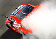 MONTREAL, QC - AUGUST 18: Justin Allgaier, driver of the #31 Brandt Chevrolet, takes the checkered flag after winning the NASCAR Nationwide Series sixth annual NAPA AUTO PARTS 200 presented by Dodge at Circuit Gilles Villeneuve on August 18, 2012 in Montreal, Quebec, Canada. (Photo by Tom Pennington/Getty Images for NASCAR)