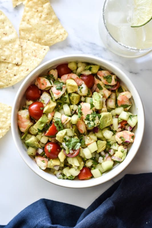 <p>Leanne Ray</p><p>This shrimp ceviche with avocado couldn’t be easier thanks to frozen, fully-cooked shrimp. Everything gets chopped and tossed together in a bowl with fresh citrus and cilantro. Simple ingredients are transformed into a beautiful and flavorful accompaniment for salty tortilla chips.</p><p><strong>Get the Recipe: </strong><a href="https://leanneray.com/shrimp-ceviche-with-avocado/" rel="nofollow noopener" target="_blank" data-ylk="slk:Shrimp Ceviche with Avocado;elm:context_link;itc:0;sec:content-canvas" class="link ">Shrimp Ceviche with Avocado</a></p>