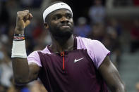 Frances Tiafoe, of the United States, reacts after scoring a point against Carlos Alcaraz, of Spain, during the semifinals of the U.S. Open tennis championships, Friday, Sept. 9, 2022, in New York. (AP Photo/John Minchillo)