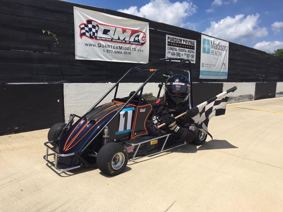 Hunter Young, a senior at Eastland-Fairfield Career & Technical Schools, is shown here with his race car.