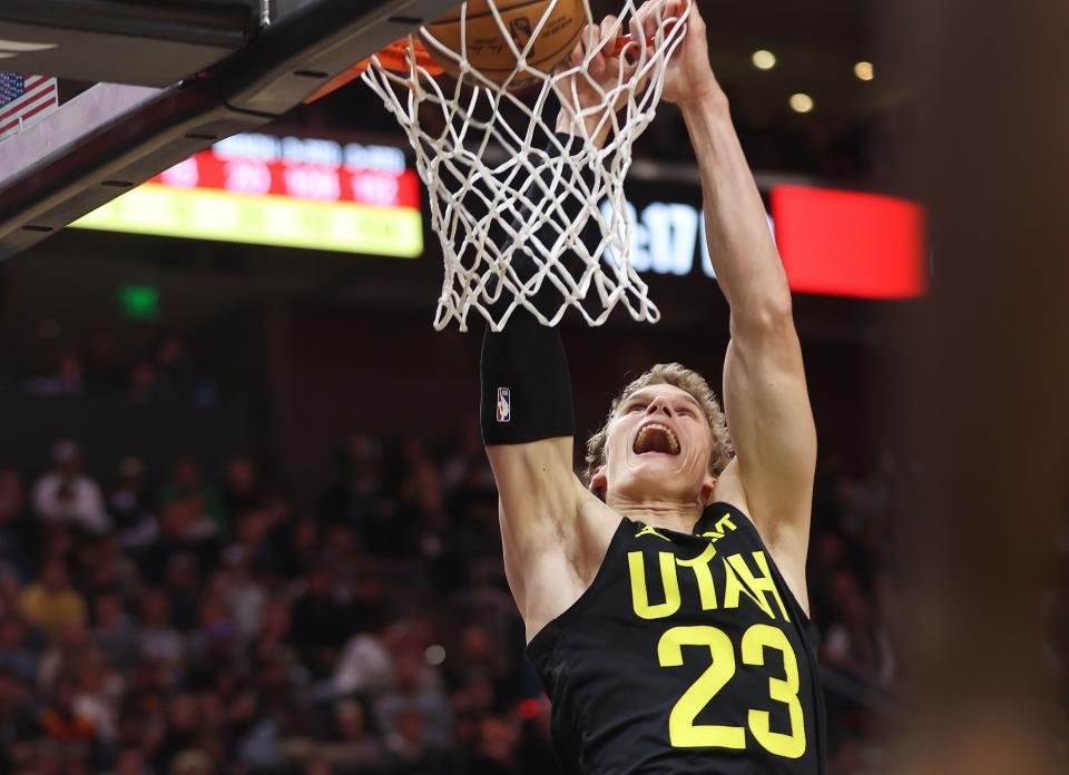 Utah Jazz forward <a class="link " href="https://sports.yahoo.com/nba/players/5769" data-i13n="sec:content-canvas;subsec:anchor_text;elm:context_link" data-ylk="slk:Lauri Markkanen;sec:content-canvas;subsec:anchor_text;elm:context_link;itc:0">Lauri Markkanen</a> (23) dunkson the LA Clippers in Salt Lake City on Friday, Oct. 27, 2023. The Jazz won 120-118. | Jeffrey D. Allred, Deseret News