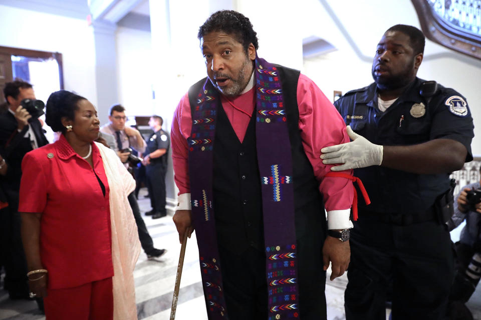 Barber is arrested for demonstrating against Republican health care legislation in Senate Majority Leader Mitch McConnell's offices on Capitol Hill, July 13, 2017. (Photo: Chip Somodevilla via Getty Images)