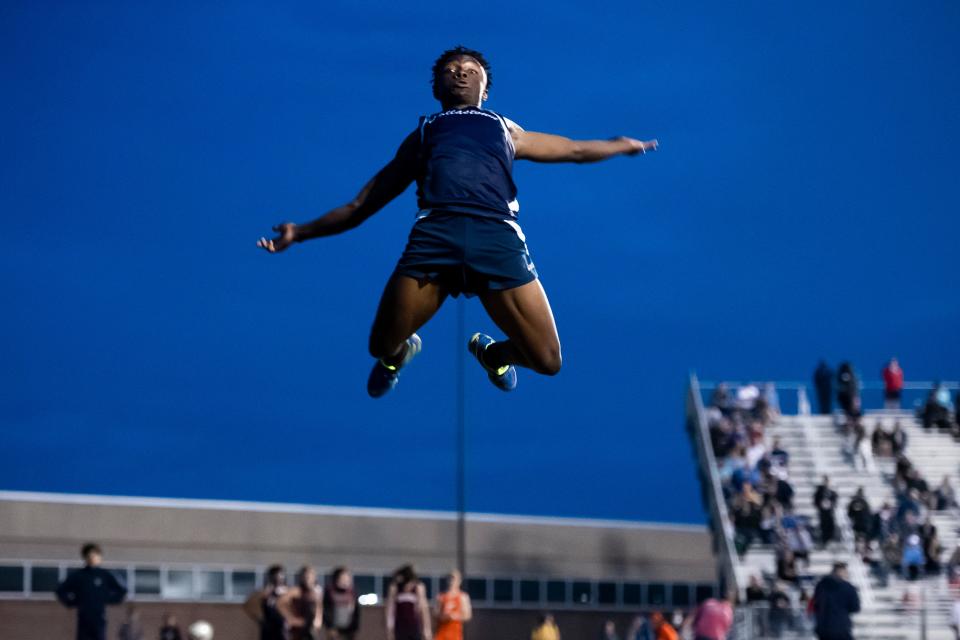 Dallastown's Michael Scott goes airborne as he competes in the long jump at the 2022 YAIAA Track and Field Championships at Dallastown Area High School on Friday, May 13, 2022. Scott, a freshman, won the event with a top jump of 20-09.50.