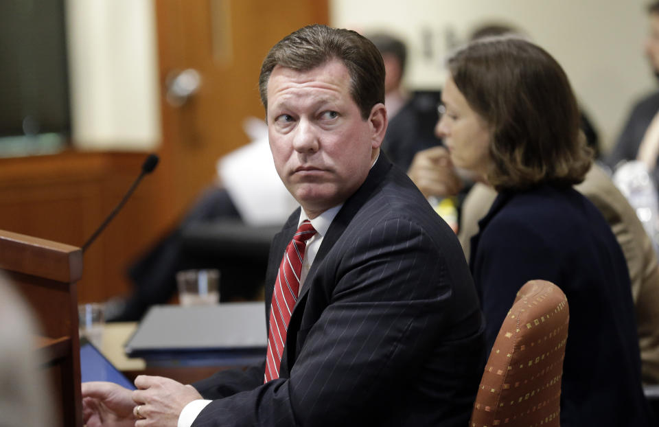 Phillip J. Strach, counsel for Legislative defendants, glances back while a three-judge panel of the Wake County Superior Court presides over the trial of Common Cause, et al v. Lewis, et al at the Campbell University School of Law in Raleigh, N.C., Monday, July 15, 2019. Common Cause, the state Democratic Party and voters challenged House and Senate maps that Republicans drew in 2017.(AP Photo/Gerry Broome)