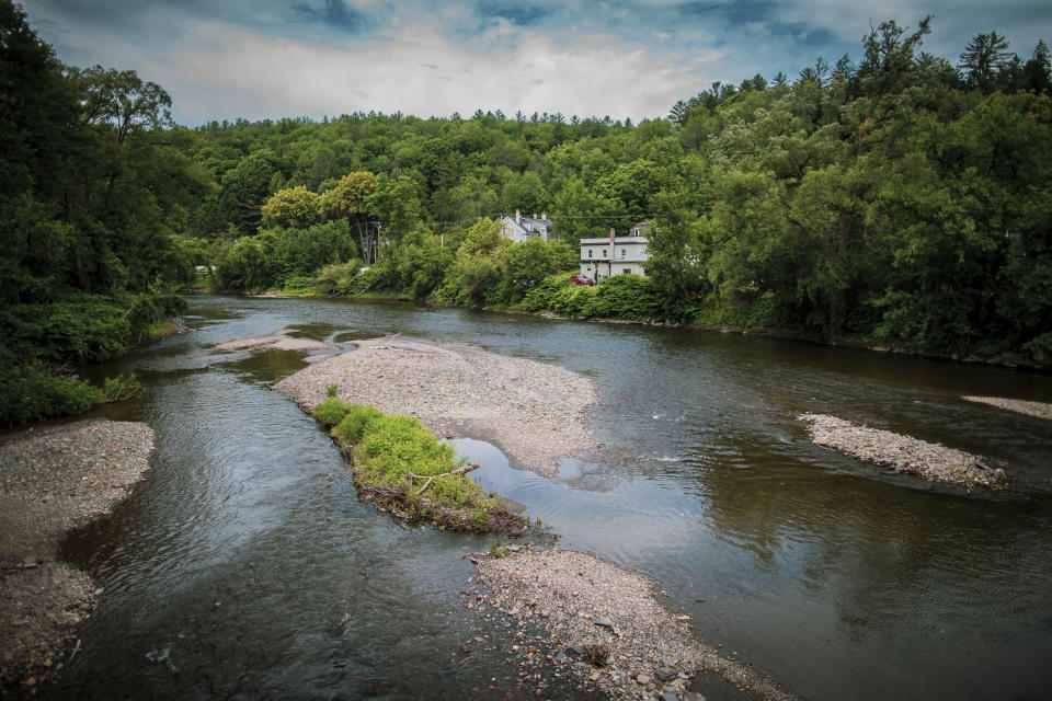 A view of the Winooski River that flooded the state's capital of Montpelier, Vermont in 2023, in this July 3, 2024 image. A year after catastrophic flooding inundated parts of Vermont, some homeowners are still in the throes of recovery. (AP Photo/ Dmitry Belyakov)