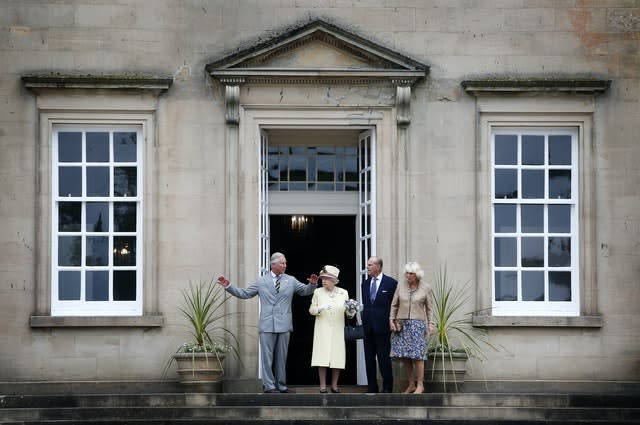 The Queen, Duke of Edinburgh and Charles and Camilla at Dumfries House, which is due to reopen to the public next week. Danny Lawson/PA Wire