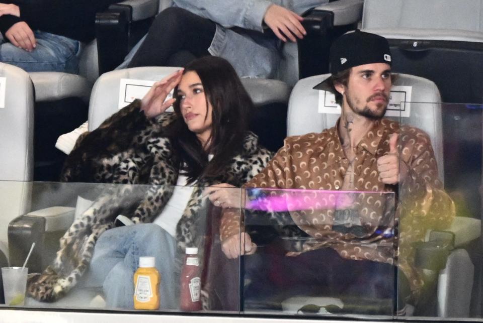 Canadian singer-songwriter Justin Bieber and his wife model Hailey Bieber watch Super Bowl 58 between the Kansas City Chiefs and the San Francisco 49ers at Allegiant Stadium.