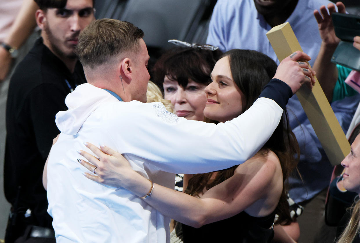 Adam Peaty shared a hug with Holly Ramsay. (Getty)