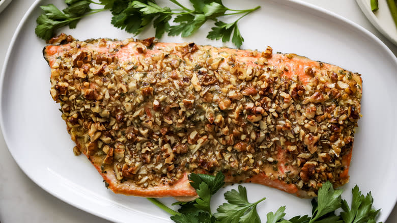 cooked salmon with parsley garnish