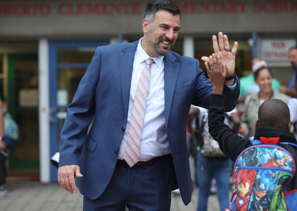 School 8 on St. Paul St.  in Rochester, NY started their first day of school today, September 7, 2022.  Interim Superintendent of Schools Carmine Peluso high fives students as they enter school.