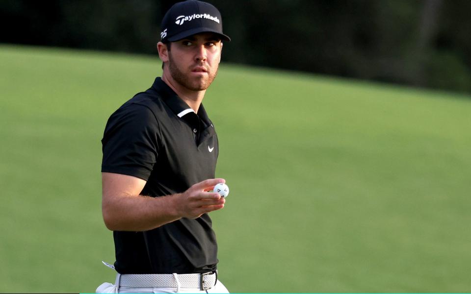 Matthew Wolff of the United States reacts on the 18th green during the first round of the Masters  - Getty