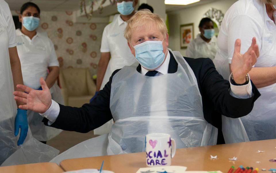 Prime Minister Boris Johnson during a visit to Westport Care Home in Stepney Green - Paul Edwards/The Sun/ PA