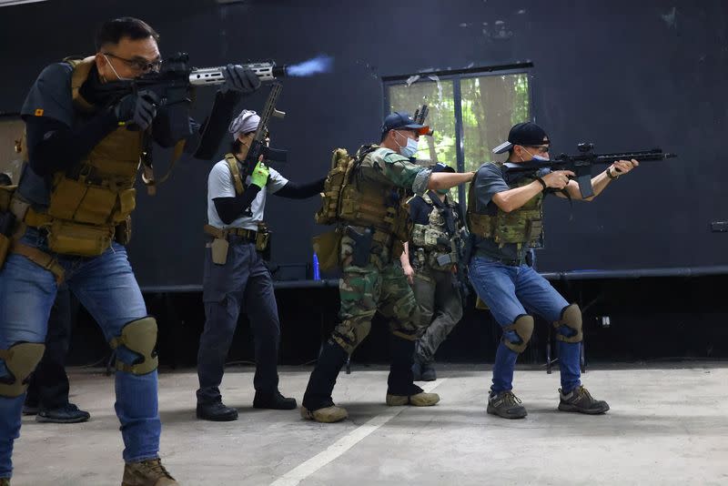 The Wider Image: More in Taiwan seek gun training as Ukraine war drives home China threat
