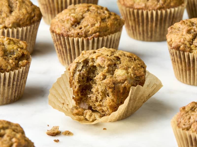 head on shot of a banana muffin with a bite taken out of it