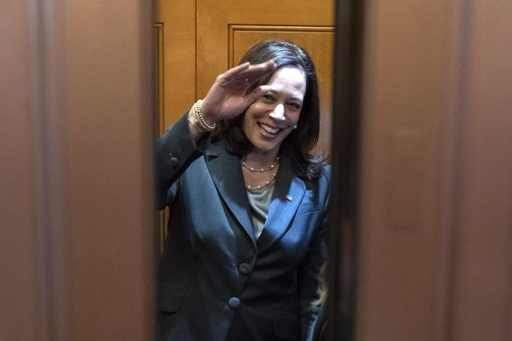 Vice President Kamala Harris waves as the door to the elevator close as the Senate prepares for a key test vote on the For the People Act, a sweeping bill that would overhaul the election system and voting rights, at the Capitol in Washington, Tuesday, June 22, 2021. (AP Photo/Alex Brandon)