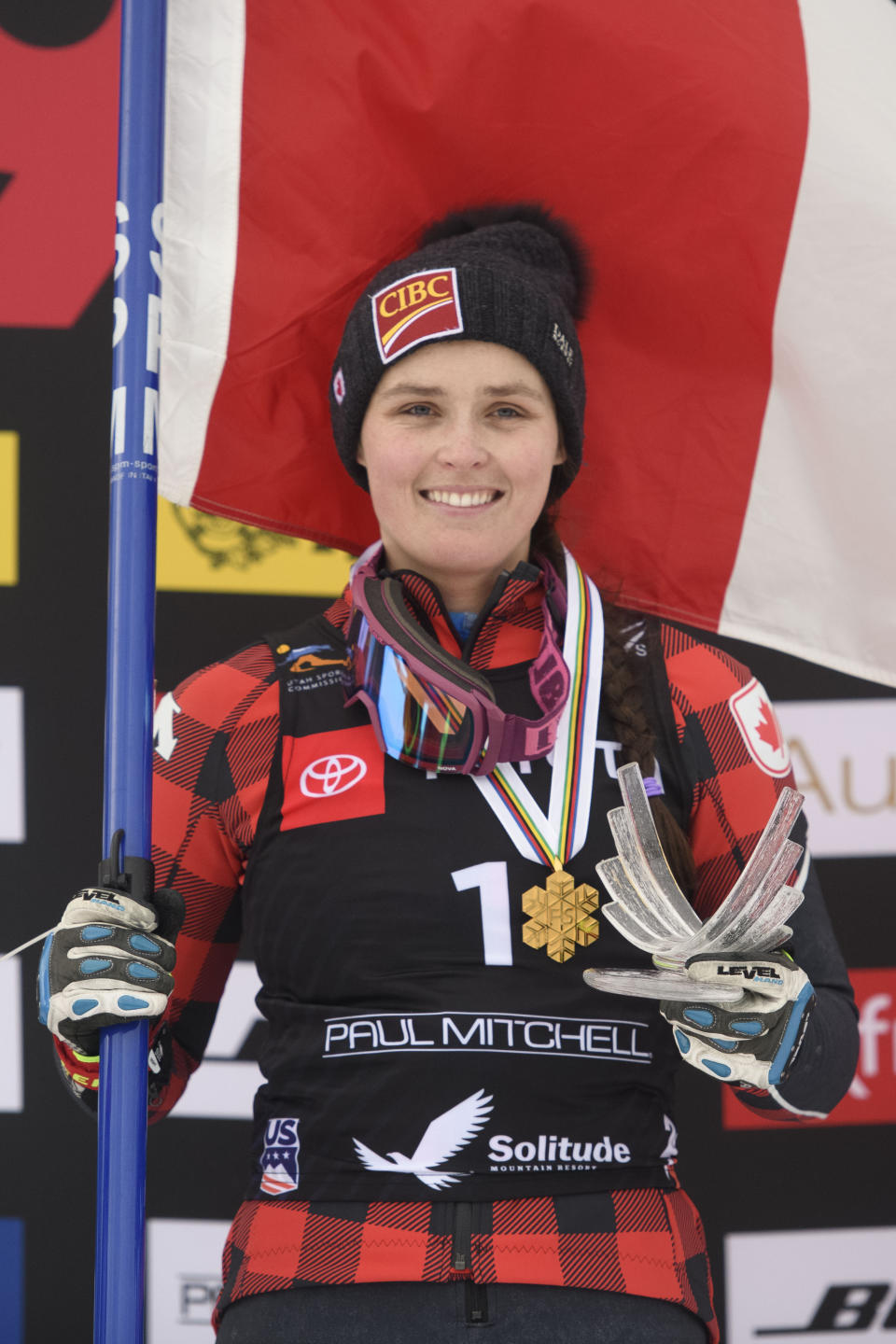 Gold medalist Marielle Thompson, of Canada, celebrates on the podium after the women's ski cross event at the freestyle ski and snowboard world championships Saturday, Feb. 2, 2019, in Solitude, Utah. (AP Photo/Alex Goodlett)