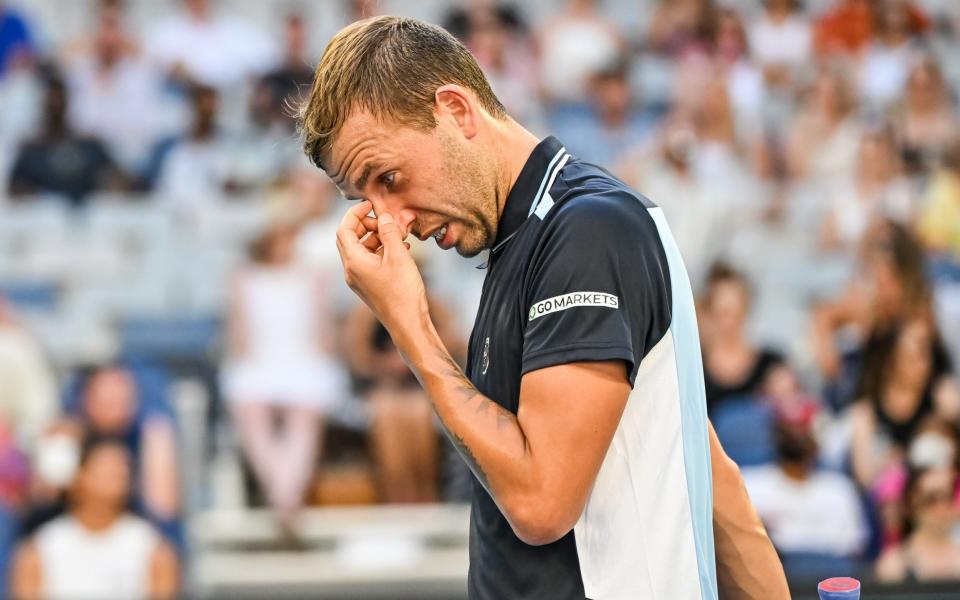Dan Evans of Great Britain looks dejected during his match against Felix Auger-Aliassime - Getty Images