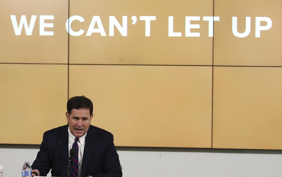 Arizona Republican Gov. Doug Ducey speaks about the latest coronavirus update at a news conference Thursday, July 9, 2020, in Phoenix. (AP Photo/Ross D. Franklin, Pool)