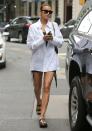 <p>Irina Shayk leaves an office building in N.Y.C. wearing an oversized top, shorts and sandals on June 22. </p>