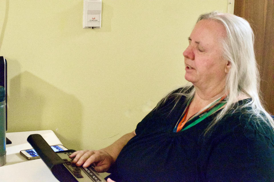 Yolanda Thompson Using a Vario Ultra Braille Note Taking device connected to her computer. (Courtesy Yolanda Thompson)