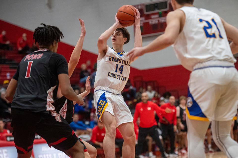 Evansville Christian’s Kaden Naab (14) eyes a shot as the Evansville Christian Eagles play the Princeton Tigers in the Bosse Winter Classic at Bosse high School Saturday, Dec. 16, 2023.