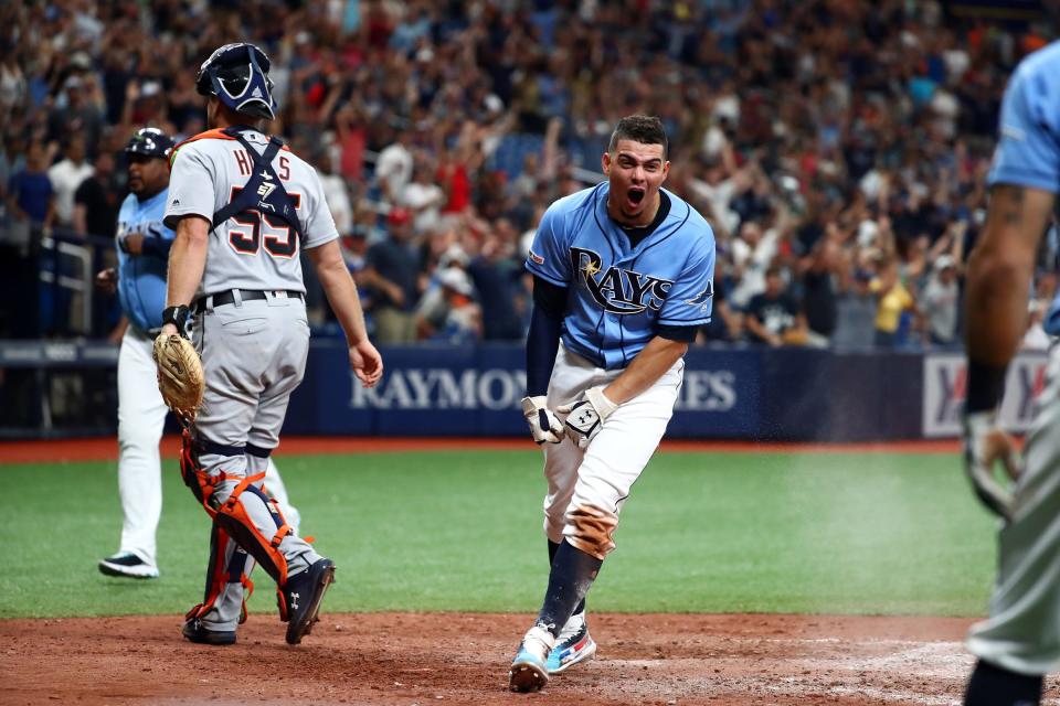 Tampa Bay Rays shortstop Willy Adames celebrates as he scores the winning run during the ninth inning to beat the Detroit Tigers, 5-4, at Tropicana Field on Aug. 18, 2019 in St. Petersburg, Fla.