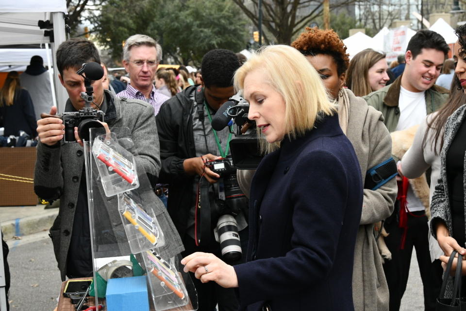 FILE - In this Feb. 9, 2019, file photo, Democratic presidential candidate Sen. Kirsten Gillibrand, D-N.Y., walks Columbia's Main Street farmers market ahead of a women's luncheon Reed hosted for her in Columbia, S.C. The Iowa caucus is still 10 months away, but the Democratic primary campaign is already an all-out sprint _ passing eye-popping markers for campaign activity and voter engagement. (AP Photo/Meg Kinnard, File)