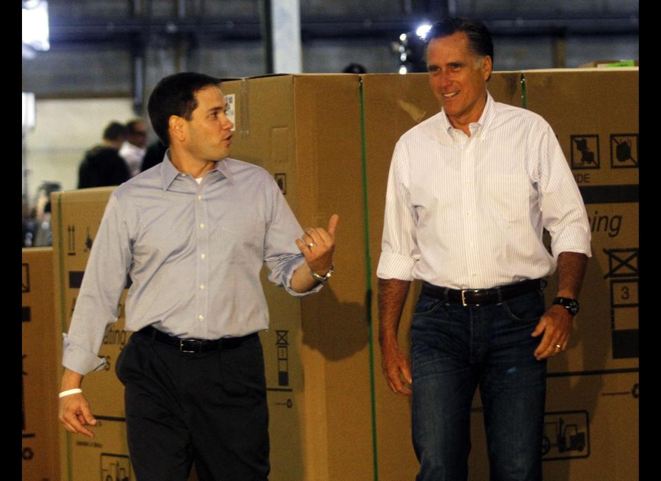 ASTON, PA - APRIL 23:  Republican presidential candidate and former Massachusetts Gov. Mitt Romney (R) arrives  before a town hall during a campaign stop with Florida Sen. Marco Rubio (L) at Mustang Expediting April 23, 2012 in Aston, Pennsylvania. Romney continues his campaign as the presumptive GOP candidate the day before the Pennsylvania primary. (Photo by Jessica Kourkounis/Getty Images)