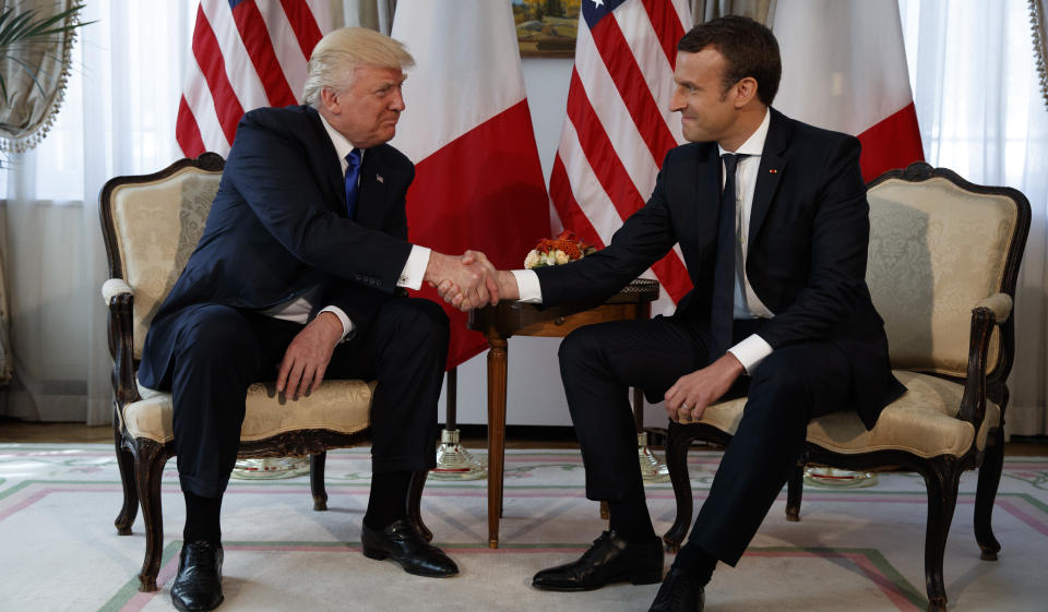 President Donald Trump shakes hands with French President Emmanuel Macron during a meeting at the U.S. Embassy, Thursday, May 25, 2017, in Brussels. (AP Photo/Evan Vucci)
