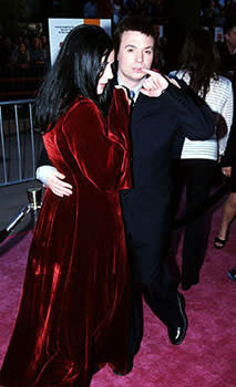 Mike Myers , with his wife Robin, gives us a little taste of Dr. Evil at the Los Angeles premiere for Austin Powers: The Spy Who Shagged Me Photo by Jeff Vespa/Wireimage.com