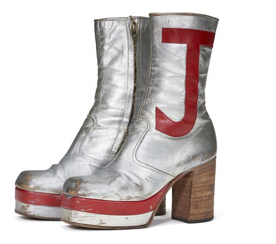 <p>CHRISTIE'S IMAGES LTD. 2024</p> Elton John's custom silver platform boots