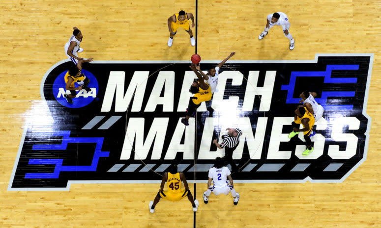 An overhead view of the March Madness midcourt logo ahead of a tipoff during the NCAA Tournament.