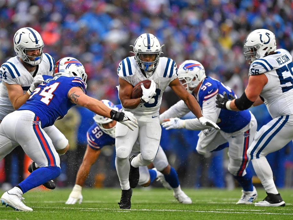 Jonathan Taylor makes a run against the Buffalo Bills.