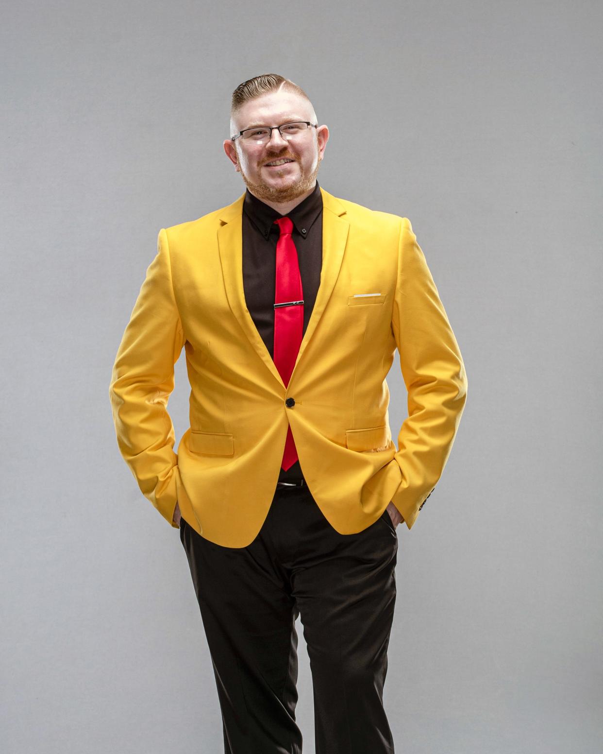 The Young Professor, AKA Matt Graifer, attired in a banana-yellow sport jacket.