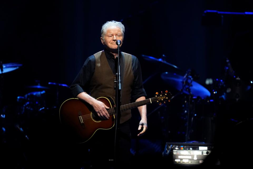 Don Henley moved between his drum kit and front of stage with a guitar during the Eagles' two-hour opening night show on The Long Goodbye Tour at New York's Madison Square Garden.