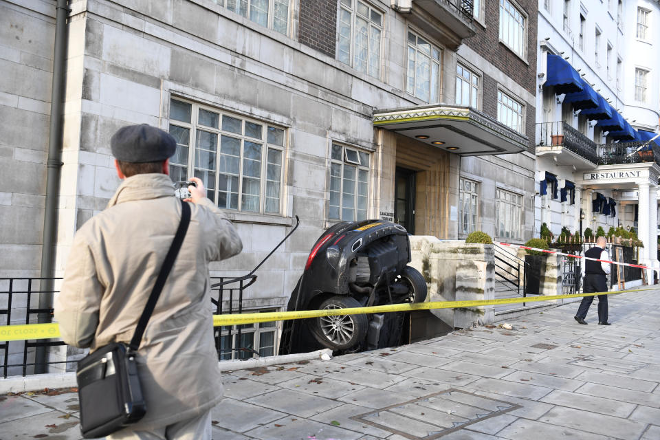 <em>Surreal – commuters were greeted by the sight of the Mercedes wedged in the basement (Pictures: PA)</em>